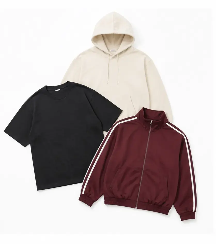 Layered hoodie, T-shirt and track jacket showing custom cut-and-sew construction